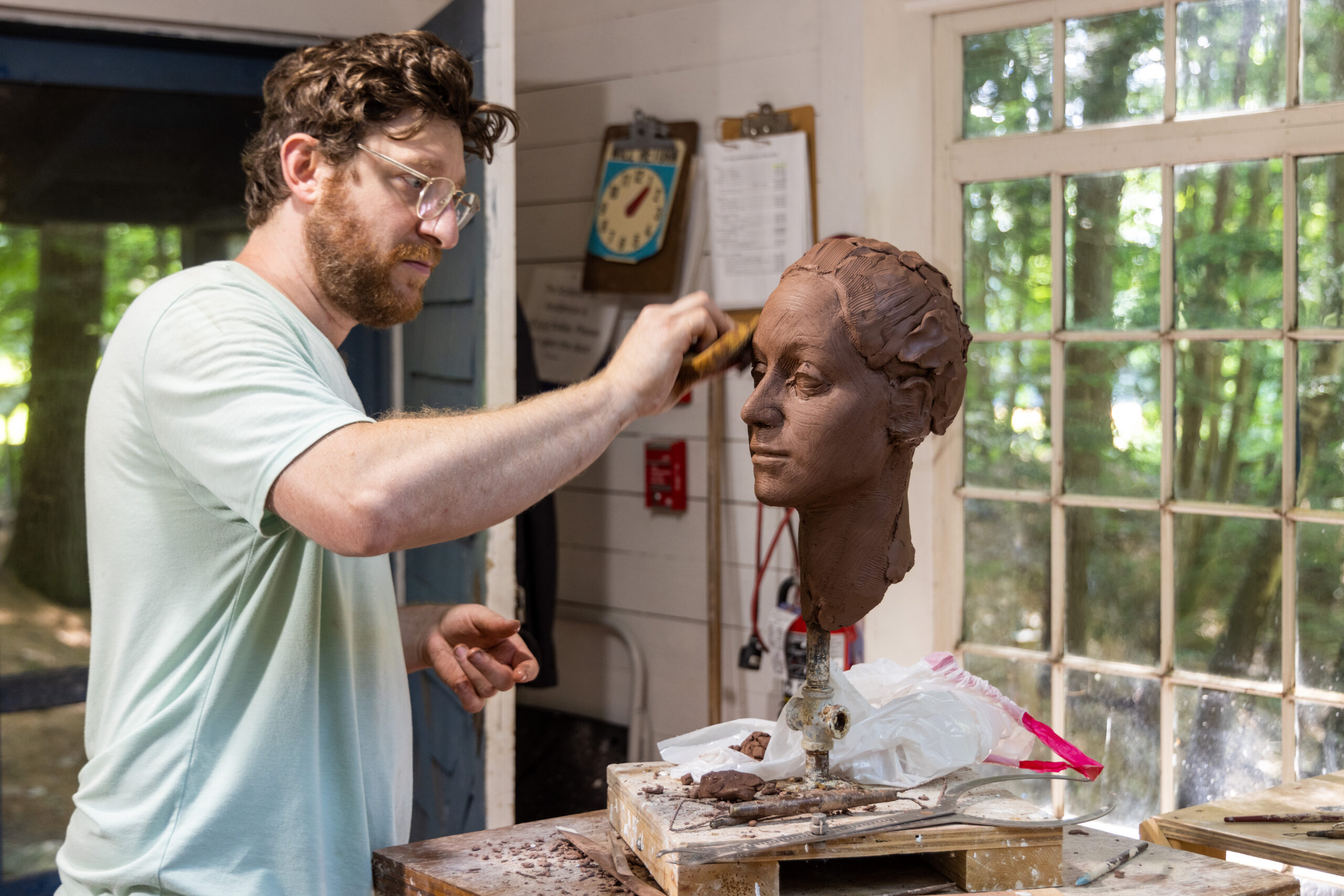 Sculptor-in- Residence Sean Hunter Williams at work in the Ravine Studio. Photo by Rob Strong